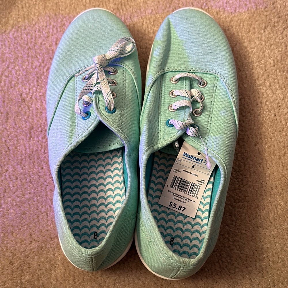 Brand new mint green sneakers. Size 8. Original shoe box not available